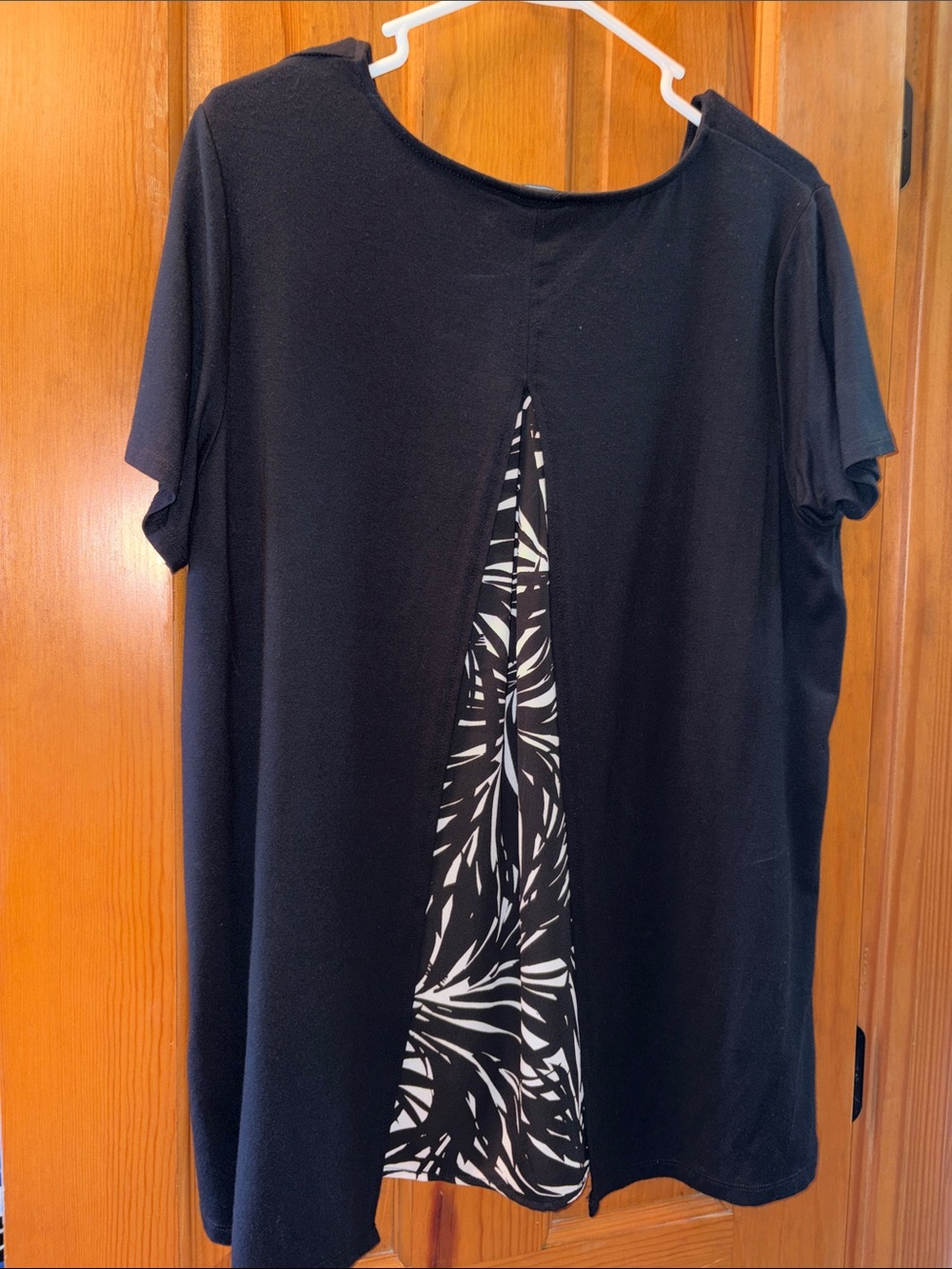 The Limited Black Short-Sleeve Top with Black-and-White Printed Back Panel